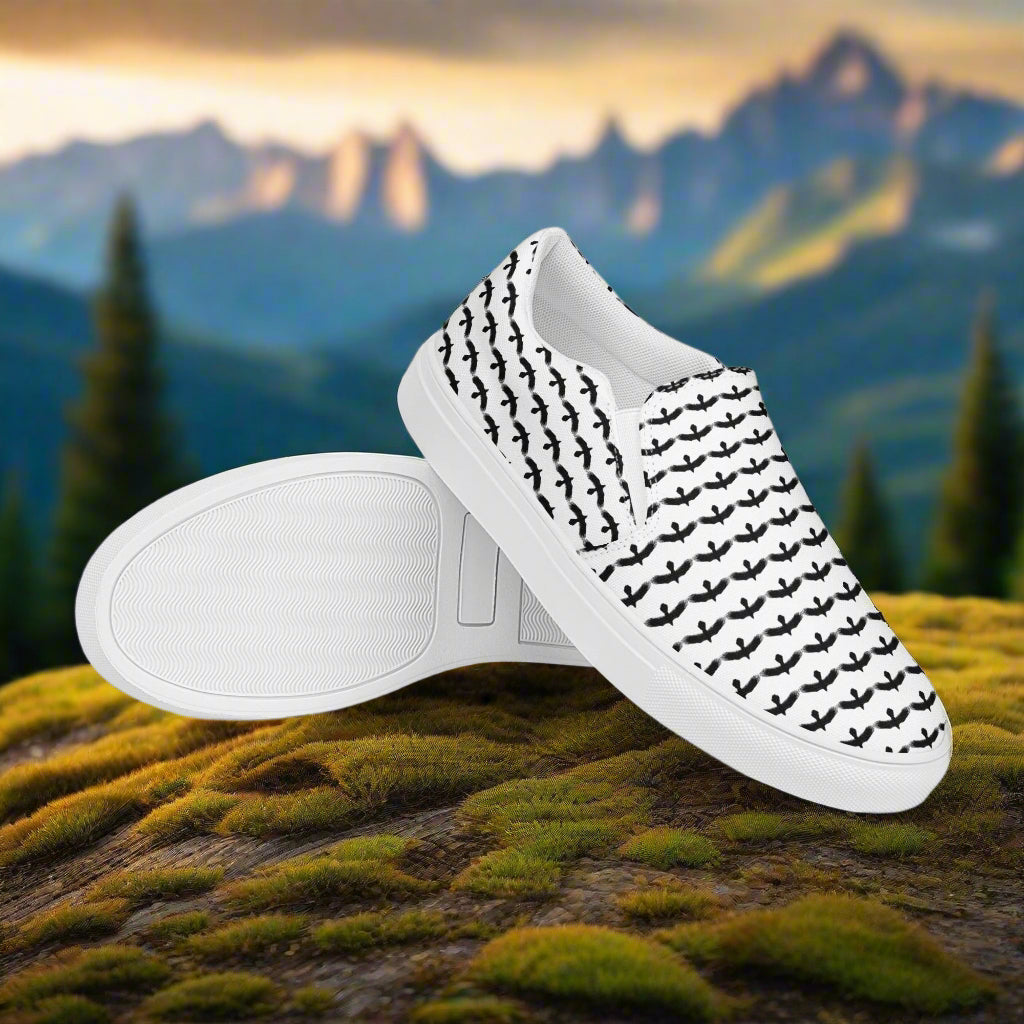 WildSage Market black raven pattern slip on shoes with white soles and black raven silhouettes