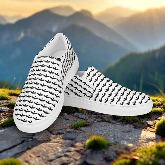 WildSage Market black raven pattern slip on shoes with white base and black raven design