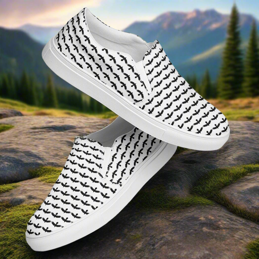 WildSage Market black raven pattern slip on shoes with white sole and comfortable design