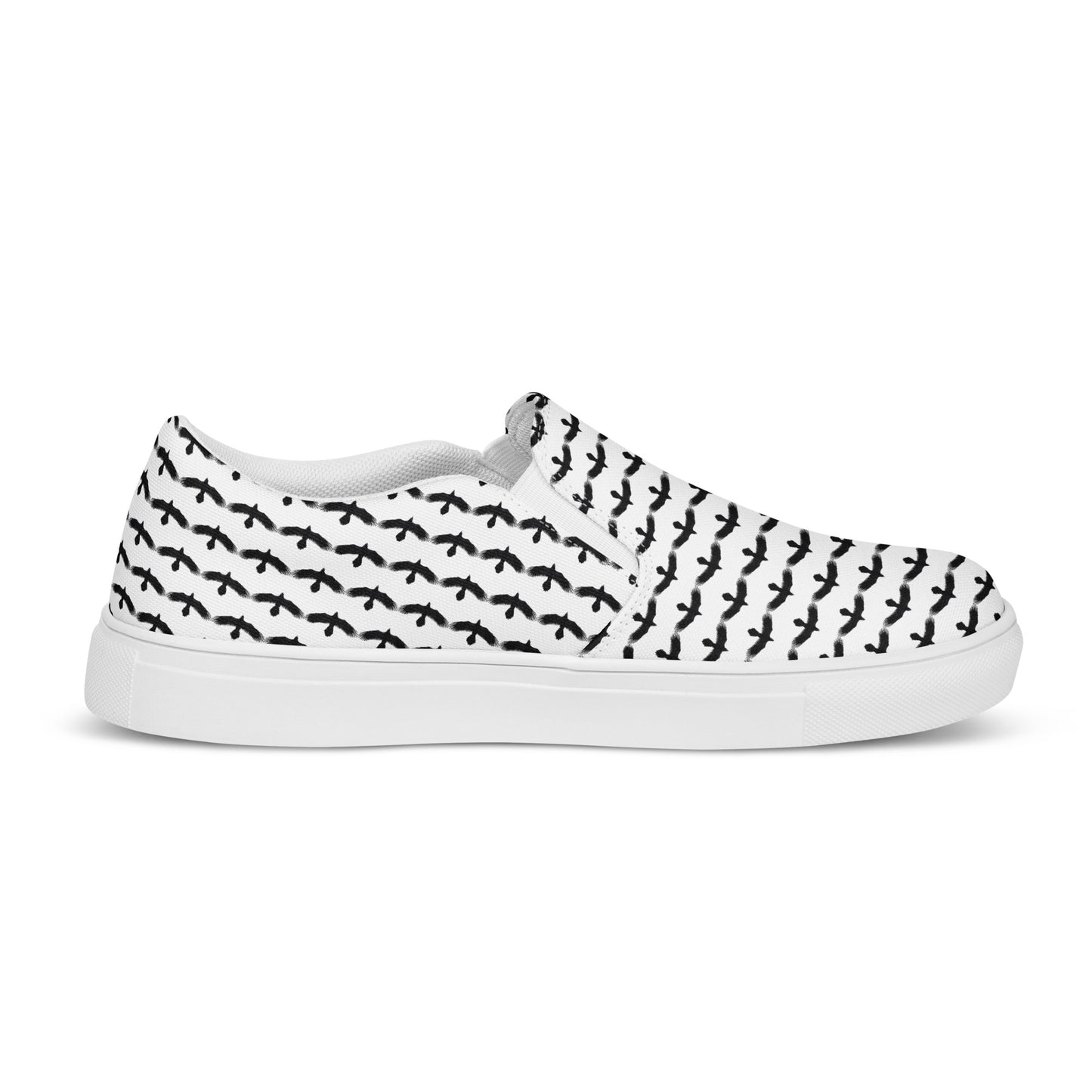 WildSage Market black raven pattern slip on shoes with white sole and all-over bird design
