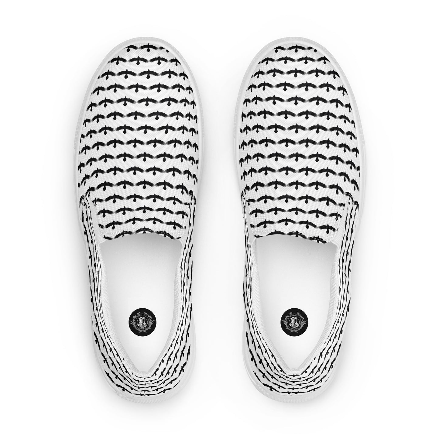 WildSage Market black raven pattern slip on shoes with white background and repeating raven design