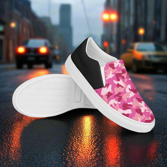 WildSage Market pink camo slip on halftone shoes with black and white accents on city street background