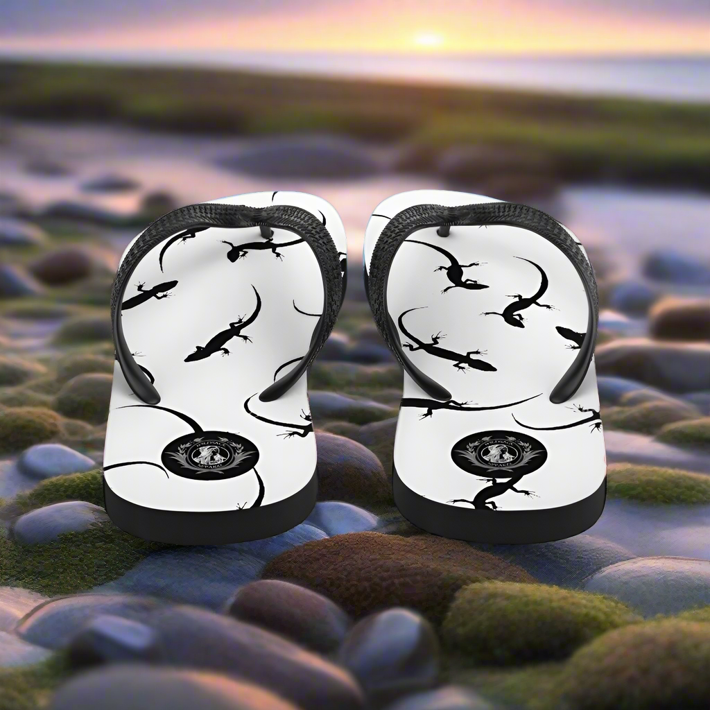 White lizard print flip-flops featuring a stylish design ideal for casual summer wear