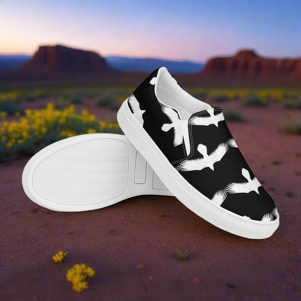 WildSage Market white Ravens slip on canvas shoes with black background and white bird design