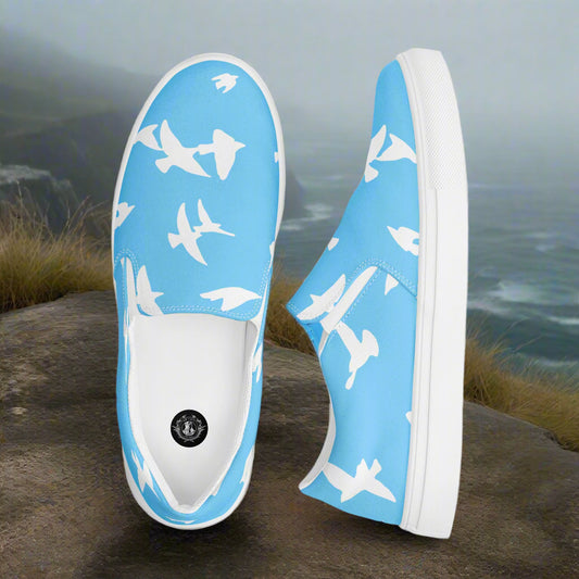 Whitebirds Blue Slip-on Canvas Shoes with a playful bird print perfect for casual wear