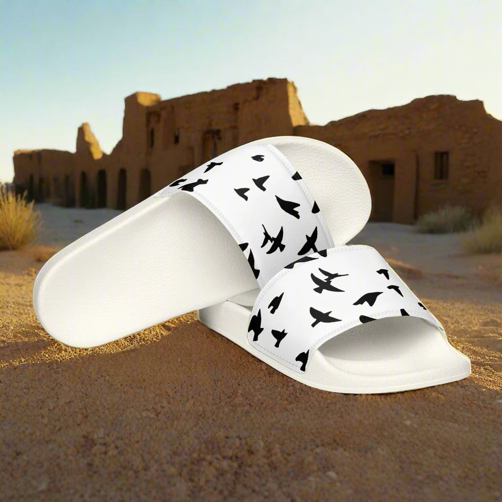 WildSage Market womens blackbird print slides with black bird silhouettes on white background