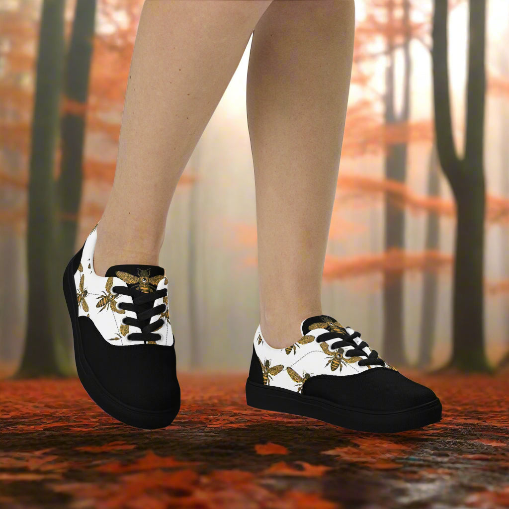 WildSage Market lace-up canvas shoes featuring bee print two tone design with black base and white patterned upper