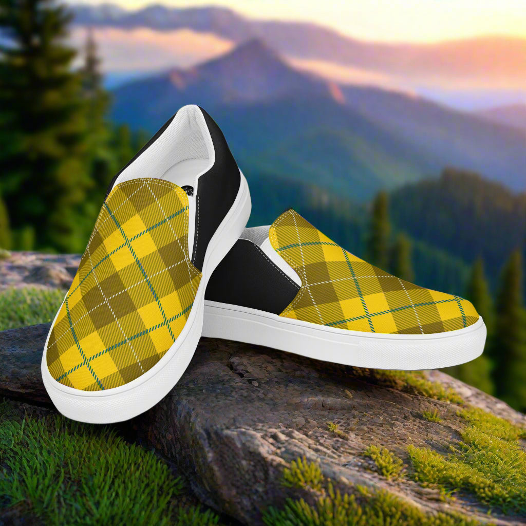 Womens Yellow Plaid Halftone Slip-On Canvas Shoes by WildSage Market with white soles on outdoor rock