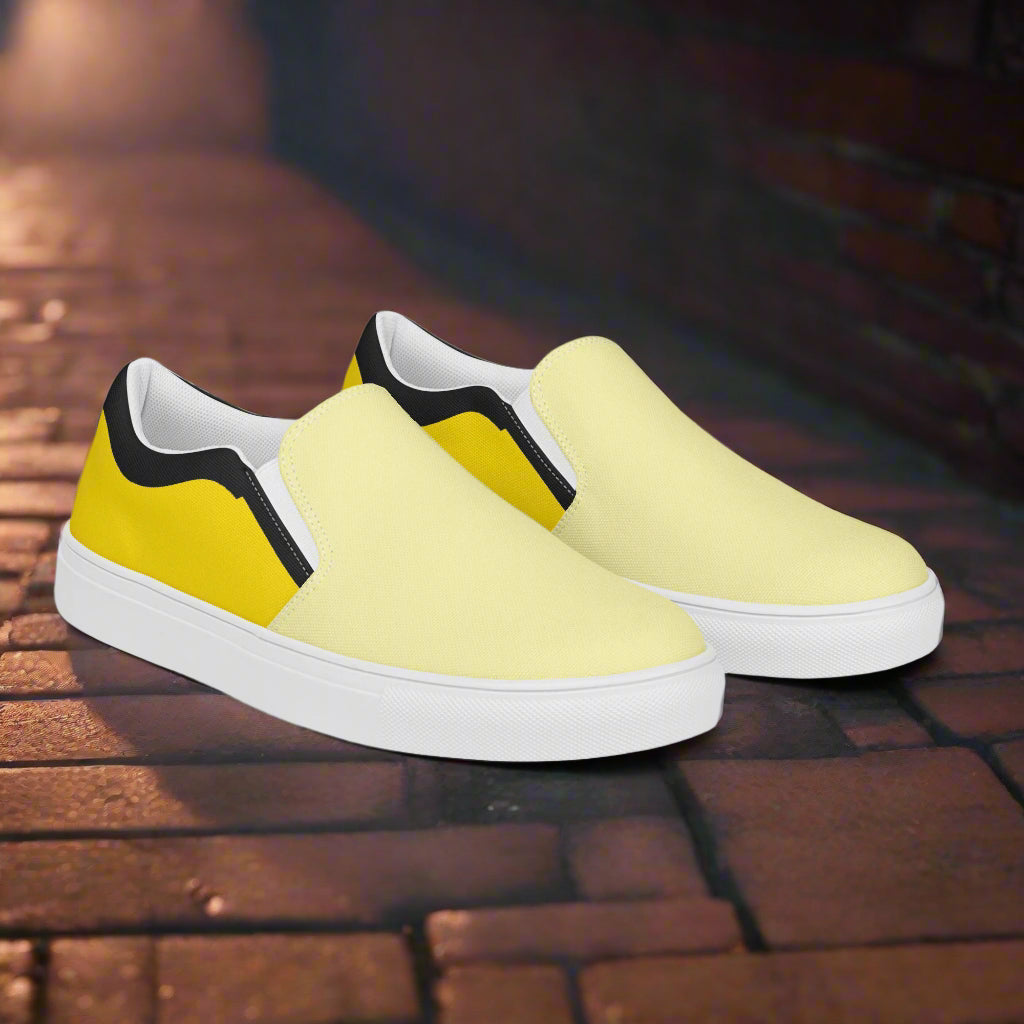WildSage Market yellow two tone slip on canvas shoes with white soles on brick floor
