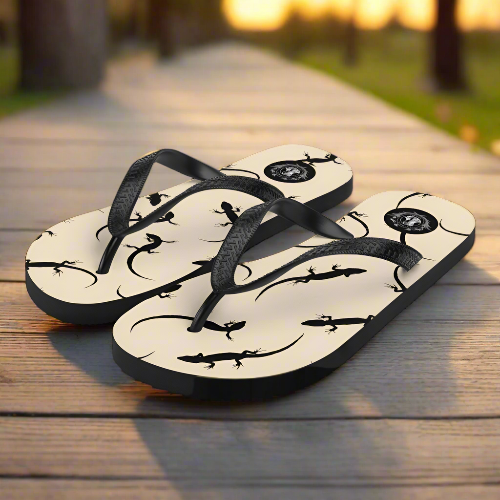 Beige lizard print flip-flops with black straps, perfect for casual summer outings