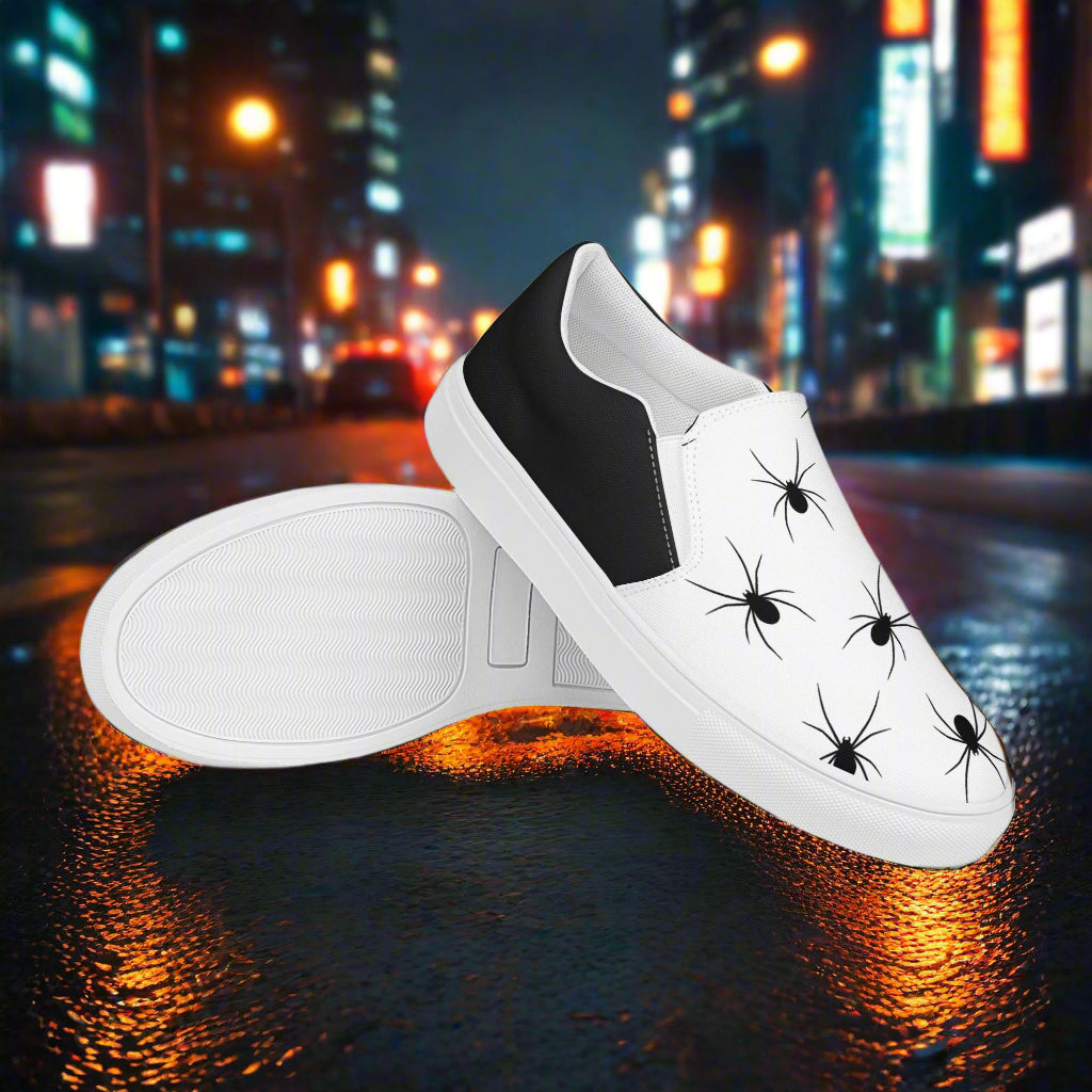 Black Spiders Halftone Slip-On Canvas Shoes featuring a stylish spider print on a white background