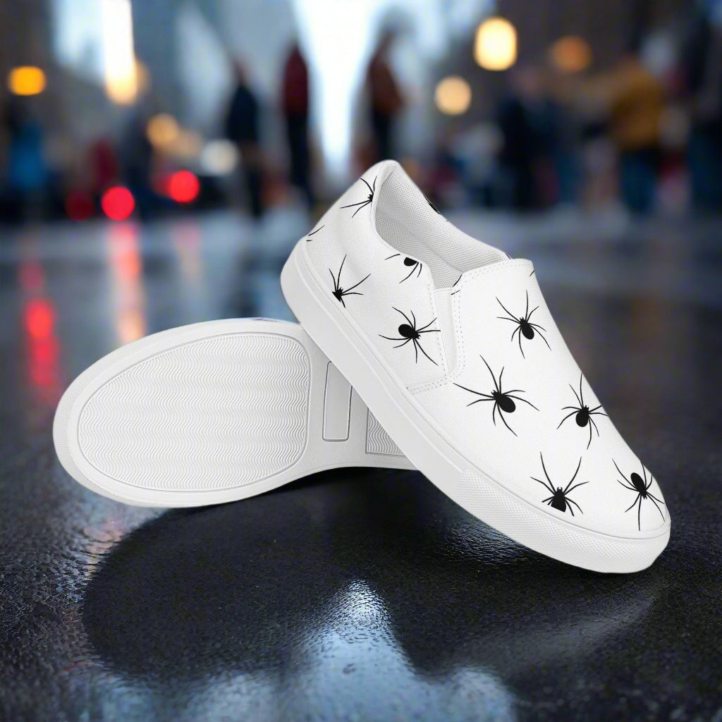 WildSage Market Black Spiders Slip-On Canvas Shoes featuring a sleek design with spider print