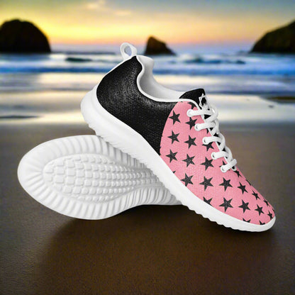 Black Stars Pink Halftone Womens Athletic Shoes by WildSage Market with white soles on a beach background