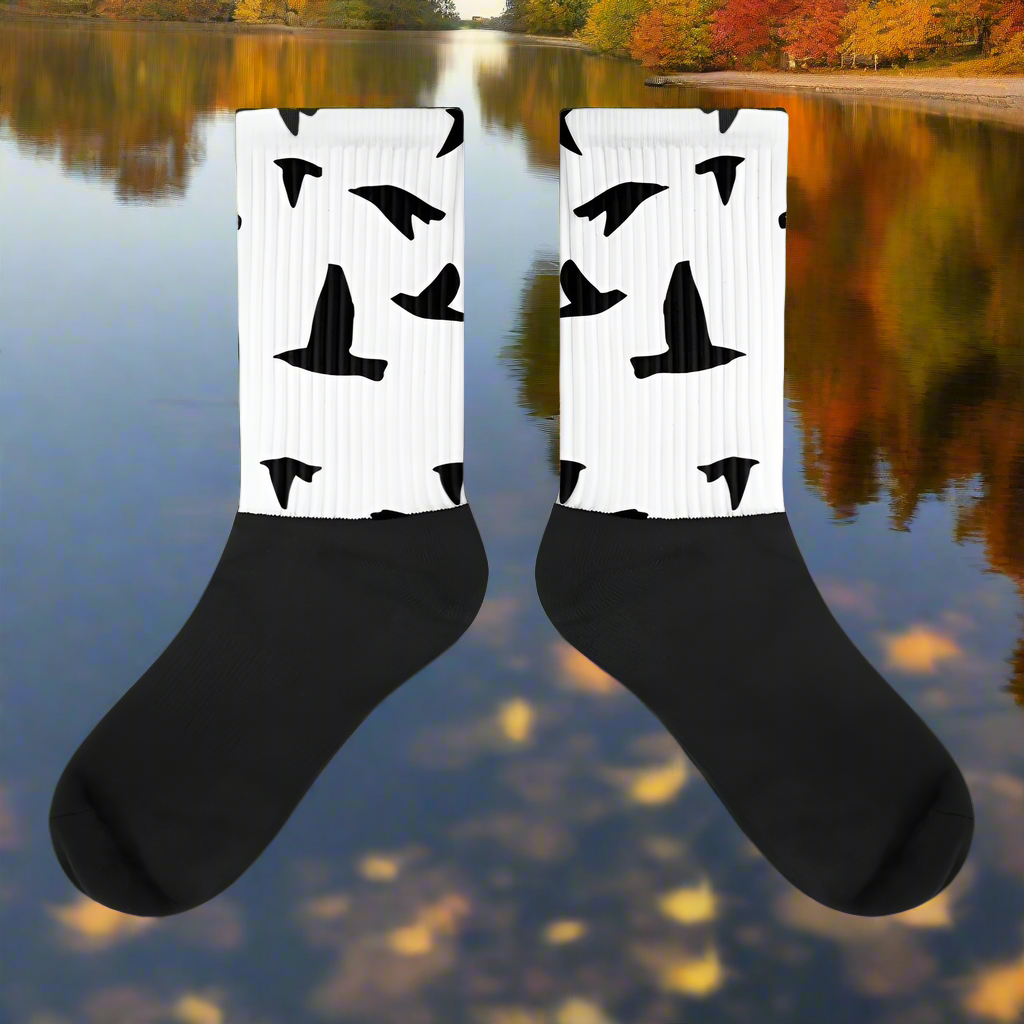 Blackbird pattern socks designed by WildSage Market with a black and white bird motif
