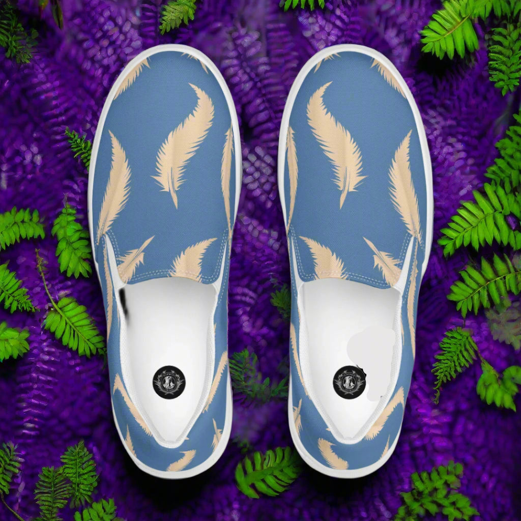 Blue Feather Slip-on Canvas Shoes with a stylish feather pattern on a blue background