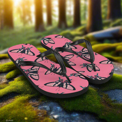 Pink butterfly print flip-flops with black straps designed for comfort and style