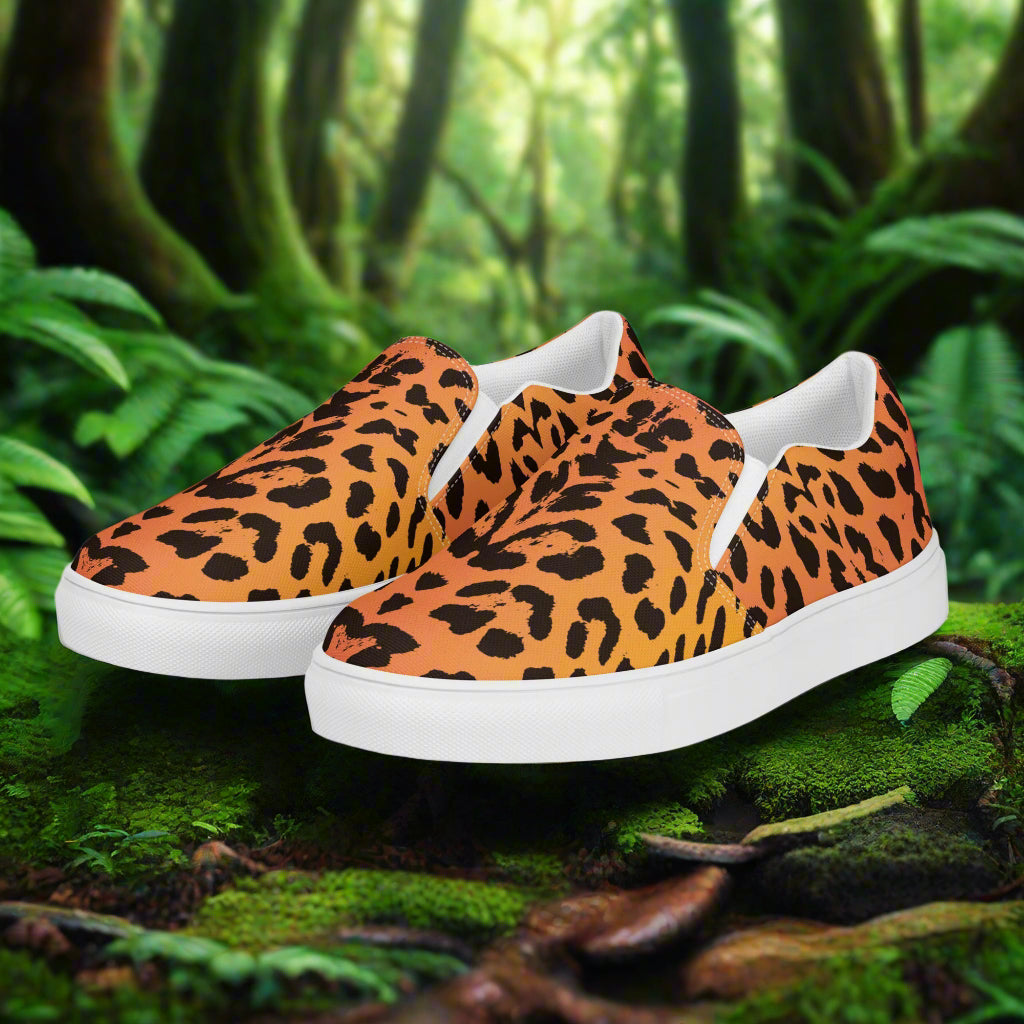 Cheetah Print Slip-on Canvas Shoes on a mossy forest floor surrounded by greenery