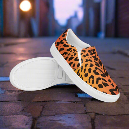 WildSage Market cheetah print slip on shoes with white soles on a cobblestone street background