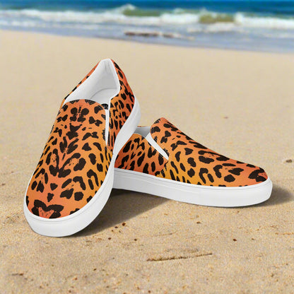 WildSage Market cheetah print slip on shoes with white soles on sandy beach background
