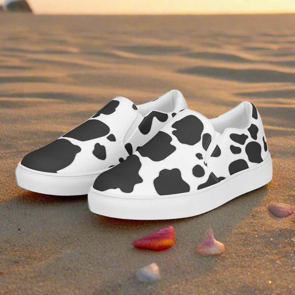 WildSage Cowhide Black Slip-on Canvas Shoes for casual wear with a stylish cow pattern
