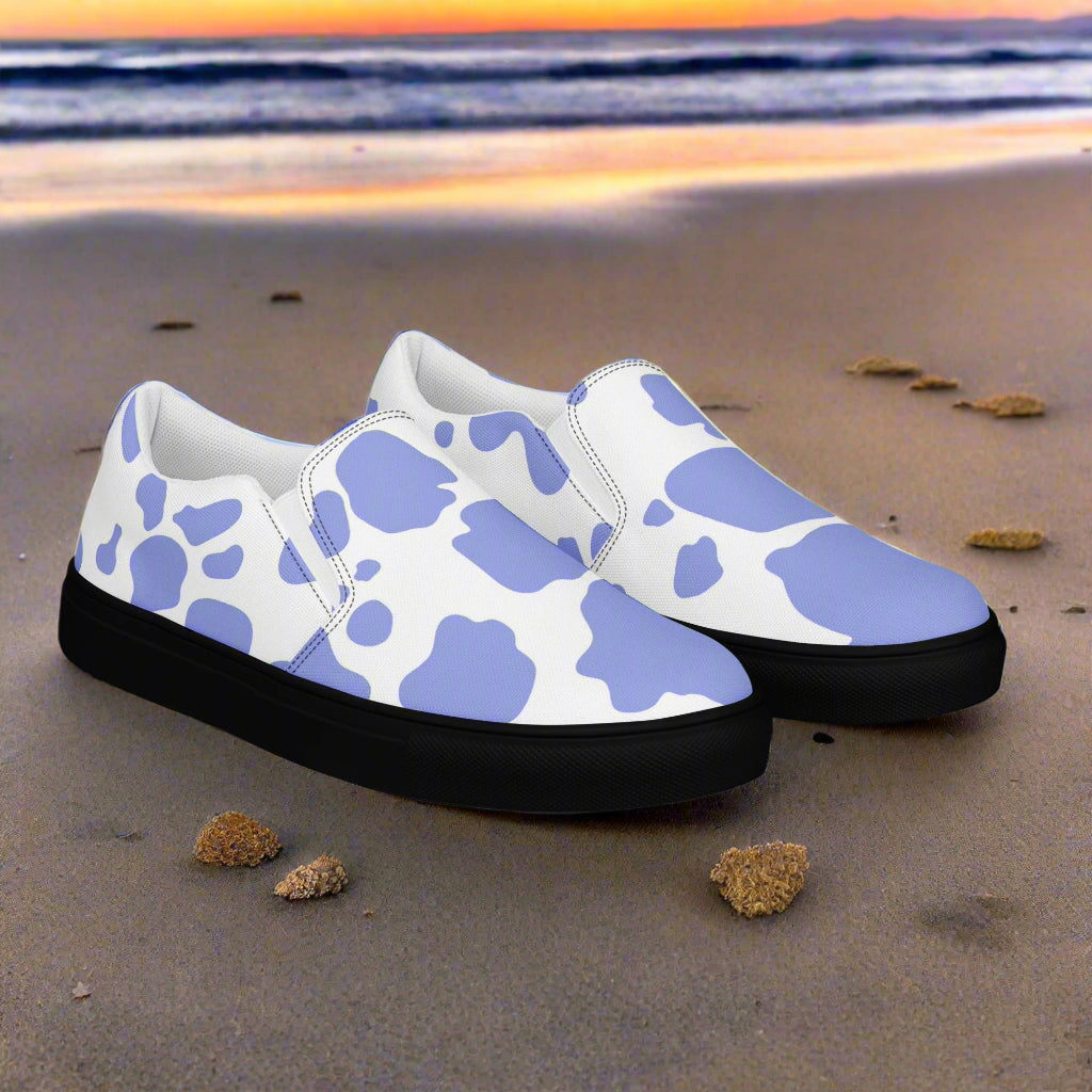 WildSage Cowhide Purple Slip-on Canvas Shoes featuring a stylish cow print design for casual wear