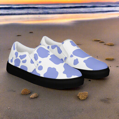 WildSage Cowhide Purple Slip-on Canvas Shoes featuring a stylish cow print design for casual wear