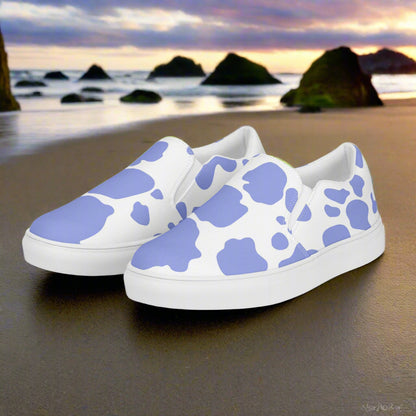 WildSage Cowhide Purple Slip-on Canvas Shoes on a beach with scenic sunset background