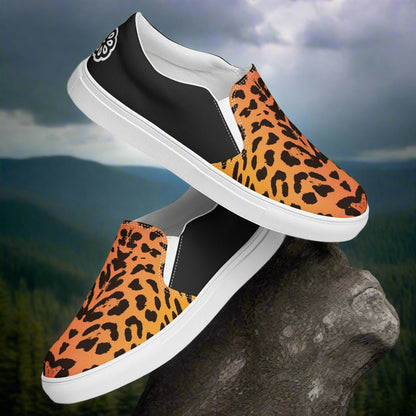 WildSage Market Mens Cheetah Halftone Slip on Canvas Shoes with black and orange leopard print design