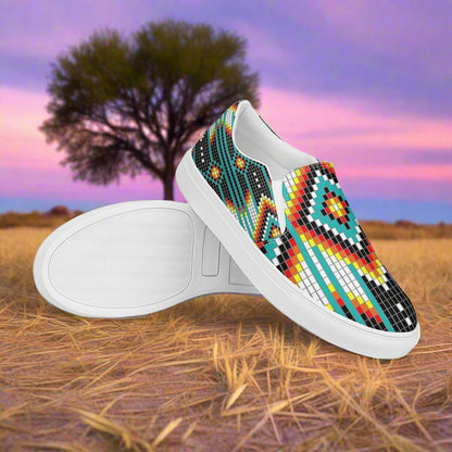 WildSage Market mens Southwest canvas slip-on shoes with vibrant geometric patterns against a natural backdrop