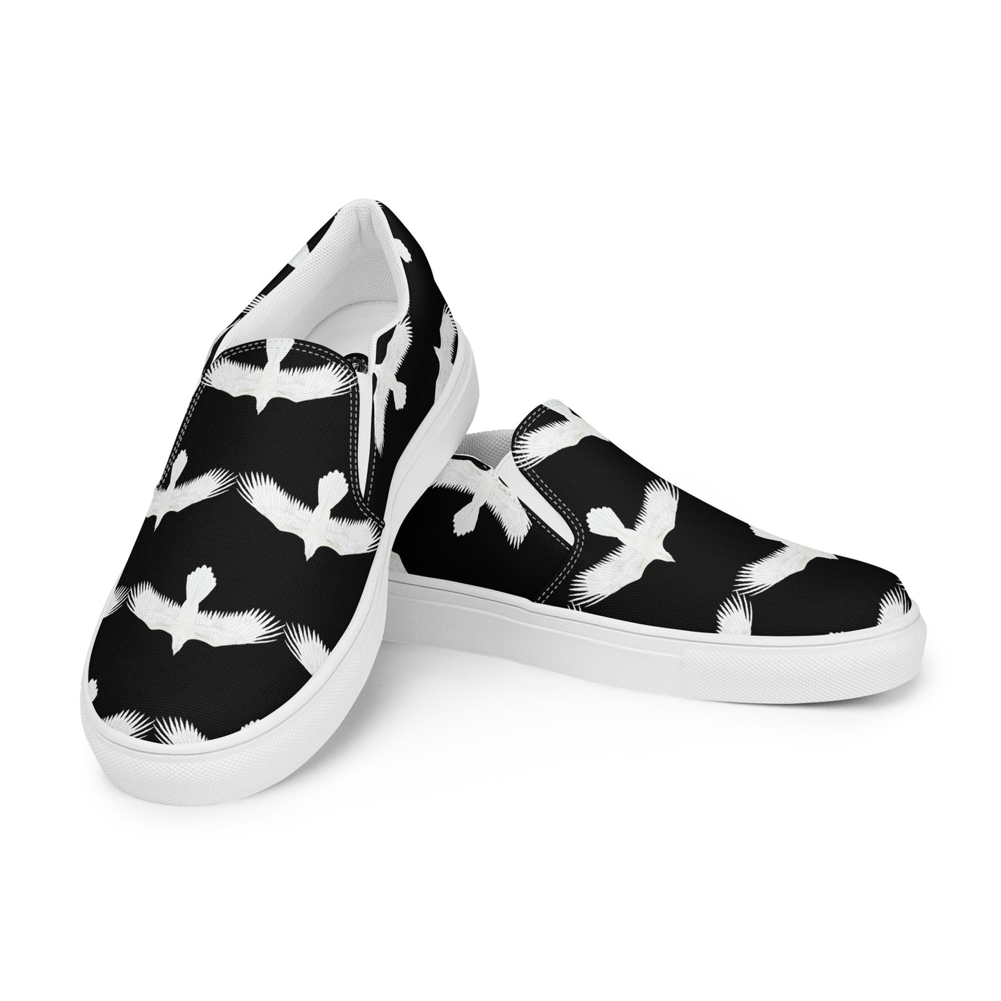 Mens white raven print slip on shoes with black background and white rubber sole by WildSage Market