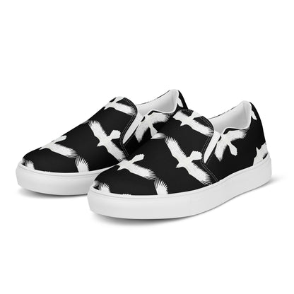 WildSage Market mens white raven print slip on shoes with black background and white sole