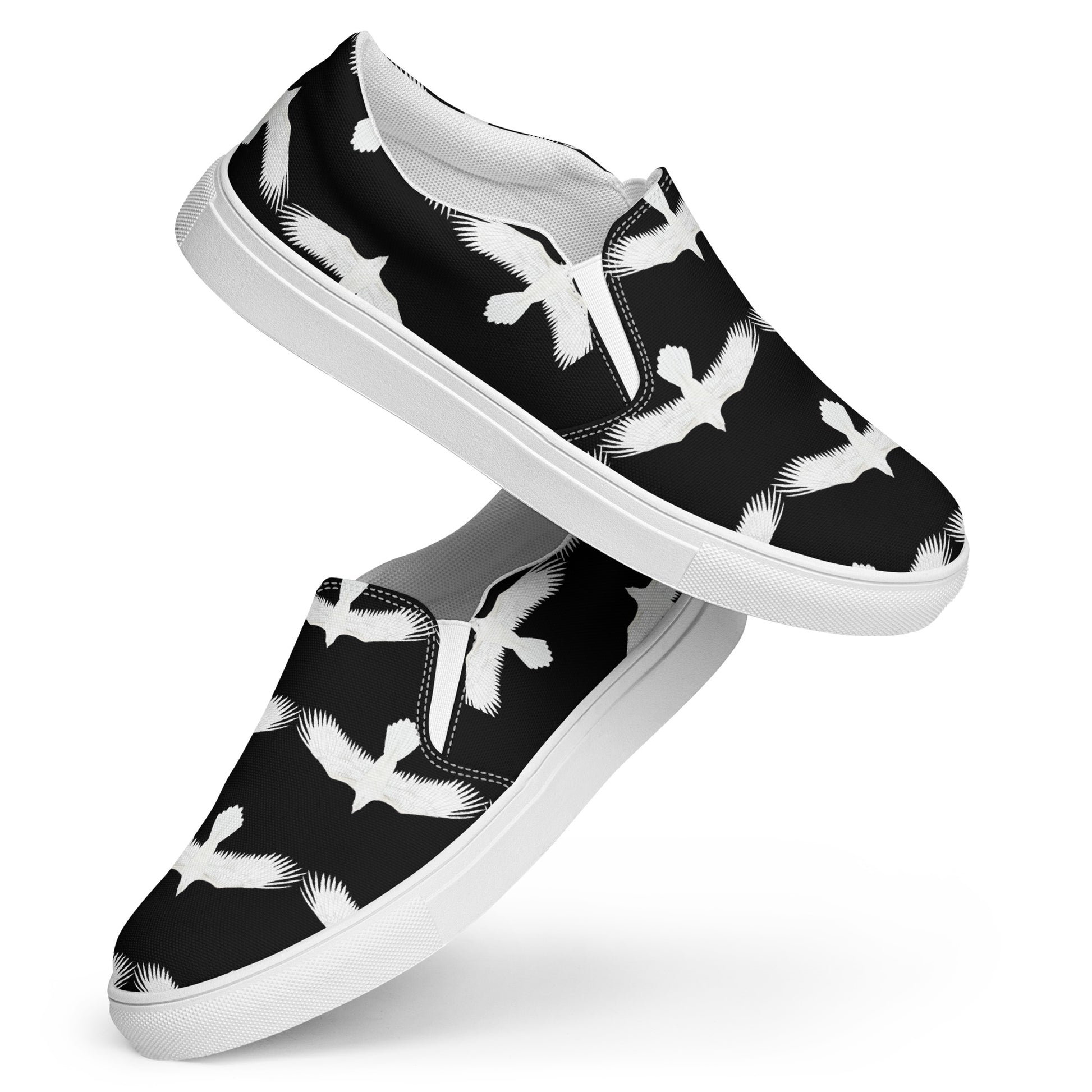 WildSage Market mens white raven print slip on shoes with black background and white bird design