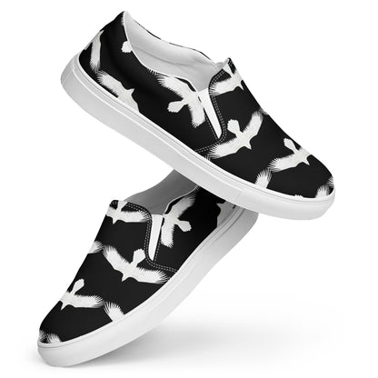 WildSage Market mens white raven print slip on shoes with black background and white bird design