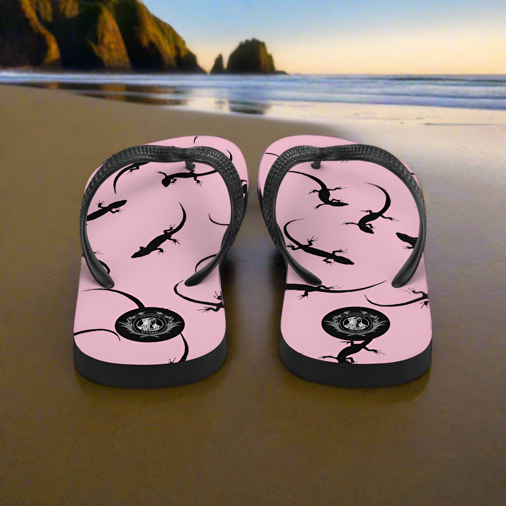 Pink lizard flip-flops with stylish lizard design perfect for beach outings and casual wear