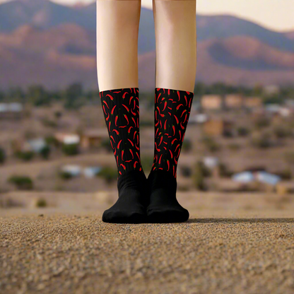 Stylish red and black hot chili socks featuring a fun chili pepper design for a playful look