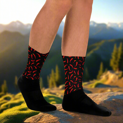 Red and black hot chili socks featuring a vibrant chili pepper pattern, perfect for adding flair to your outfit