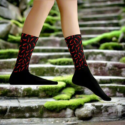 Red and black hot chili socks featuring a fun chili pepper design for stylish and playful outfits
