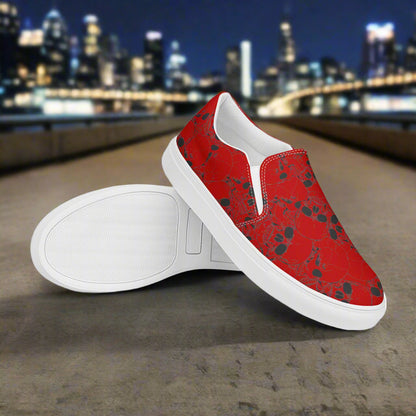WildSage Skull Pile Crimson Slip-On Canvas Shoes with a vibrant red skull design on a white sole