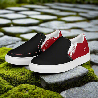 Slip-on Canvas Shoes Red Crane Two Tone featuring stylish black and red design on a stone pathway