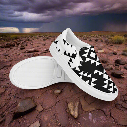 Slip-on Canvas Shoes Sonora Reverse Two Tone with geometric black and white design on a rocky terrain