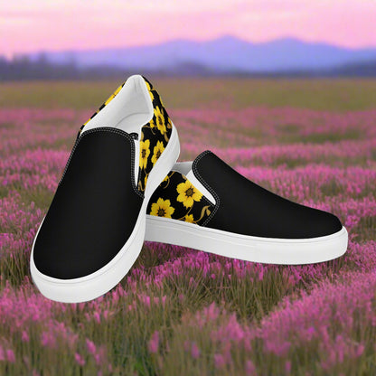 Slip-on Canvas Shoes Yellow Bloom Two Tone with black and yellow floral design against a scenic background