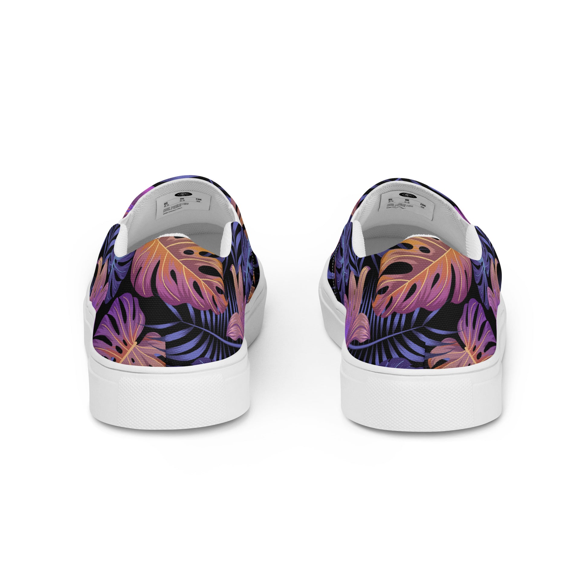 WildSage Market Slip-on Floral Print Canvas Shoes with vibrant tropical leaves design on a black background
