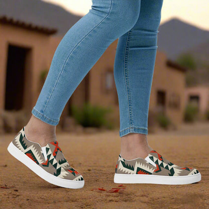 Southwest print Big Mesa slip on shoes by WildSage Market worn with blue jeans outdoors