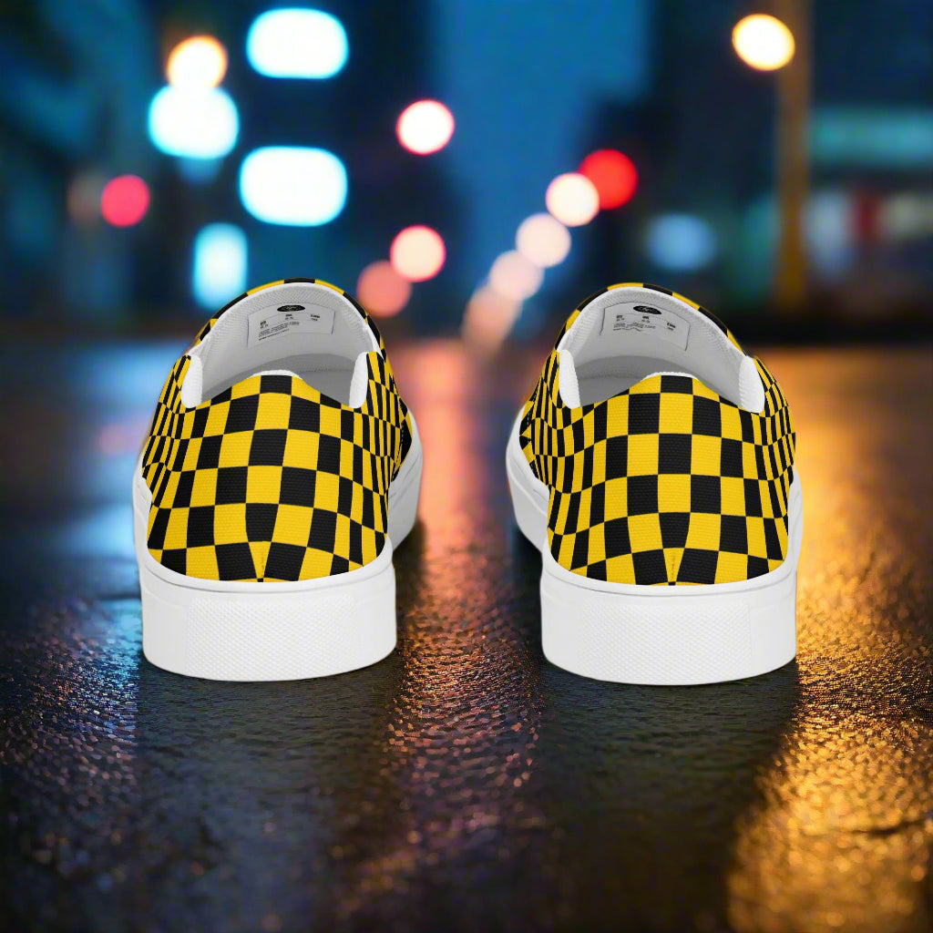 Taxi Chex Slip-On Canvas Shoes with a bold black and yellow checkered pattern for stylish comfort