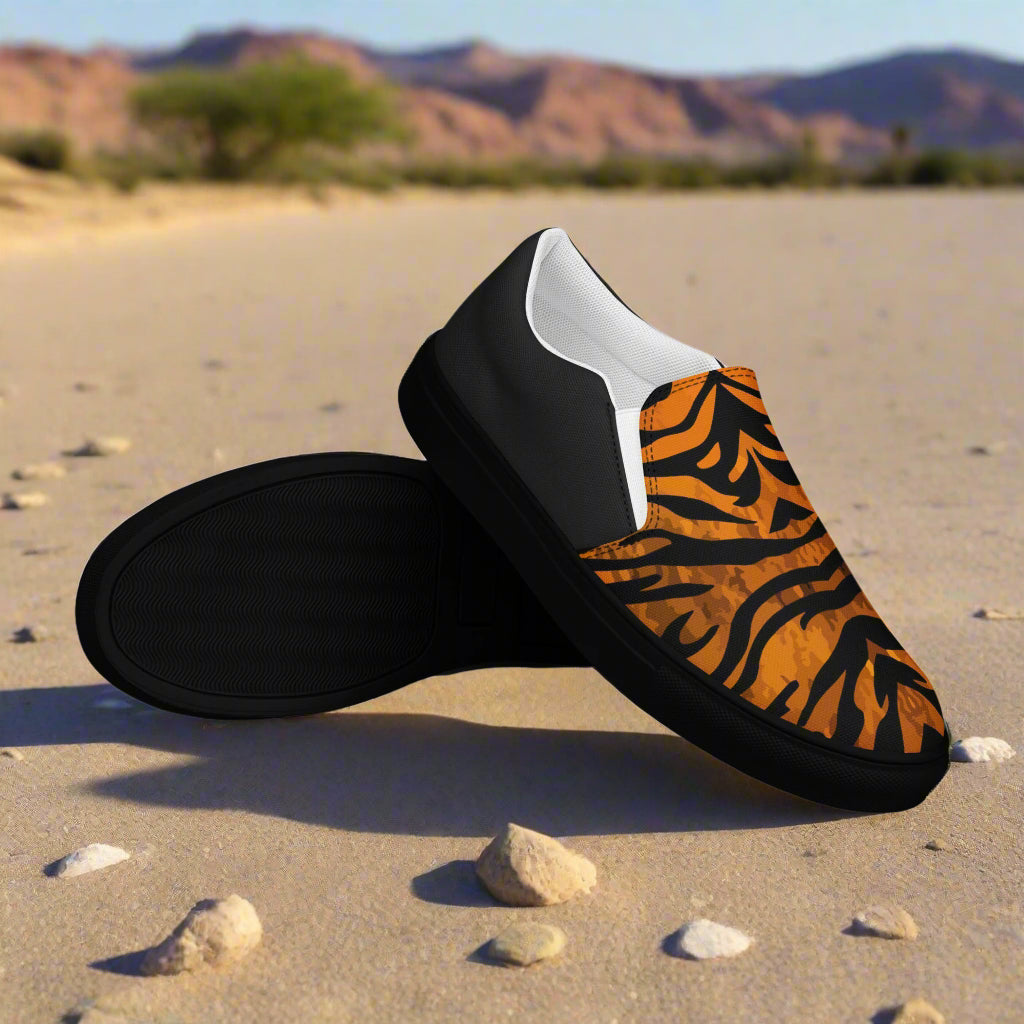 WildSage Market slip on shoes featuring tiger print halftone pattern with black and orange design