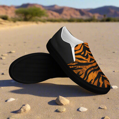 WildSage Market slip on shoes featuring tiger print halftone pattern with black and orange design