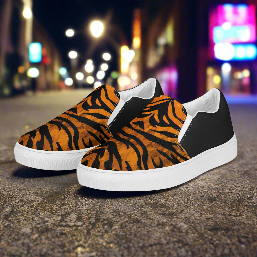 WildSage Market slip on shoes featuring bold tiger print halftone design with black and white accents
