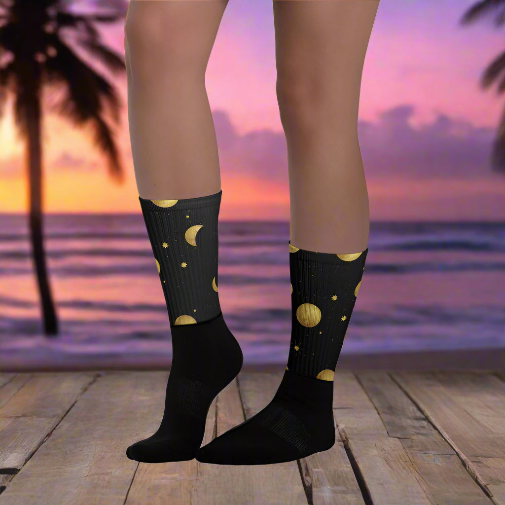Unique Moon and Stars socks featuring a celestial design in black and gold for added flair