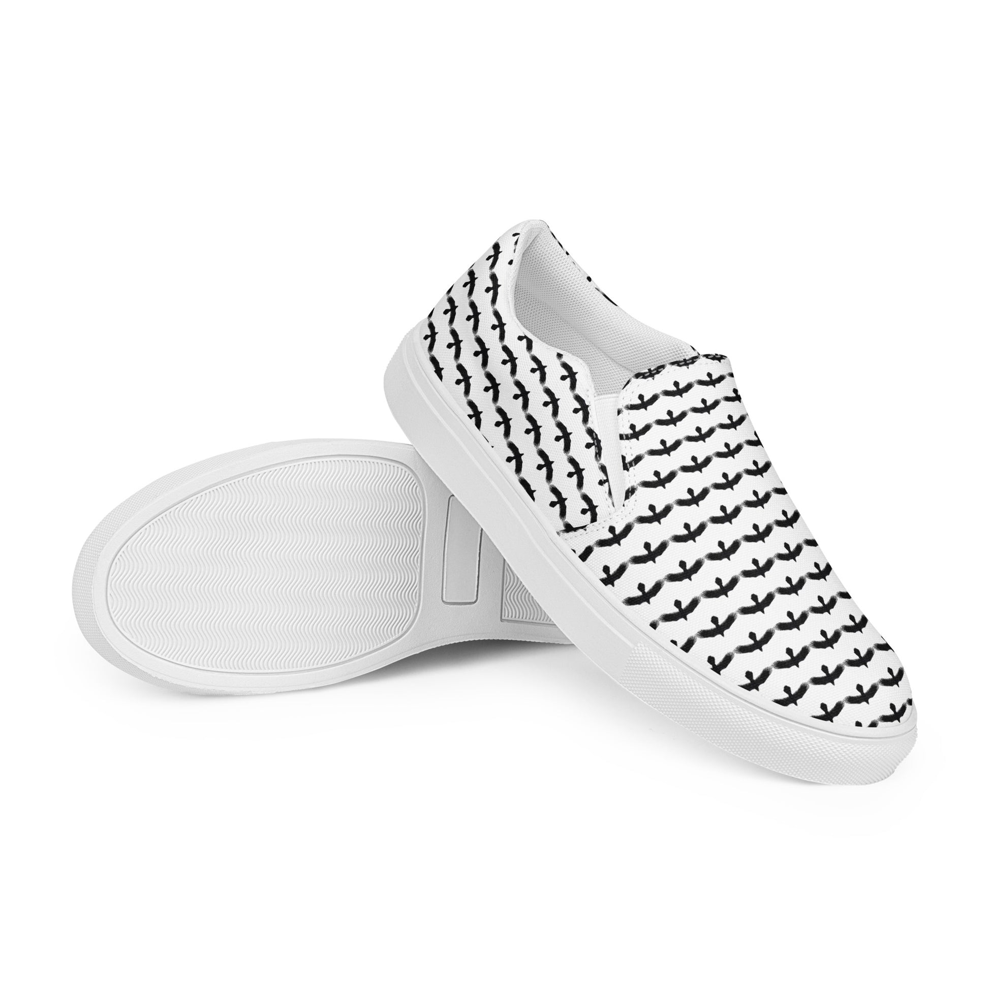 WildSage Market black raven pattern slip on shoes with white soles and black raven silhouettes