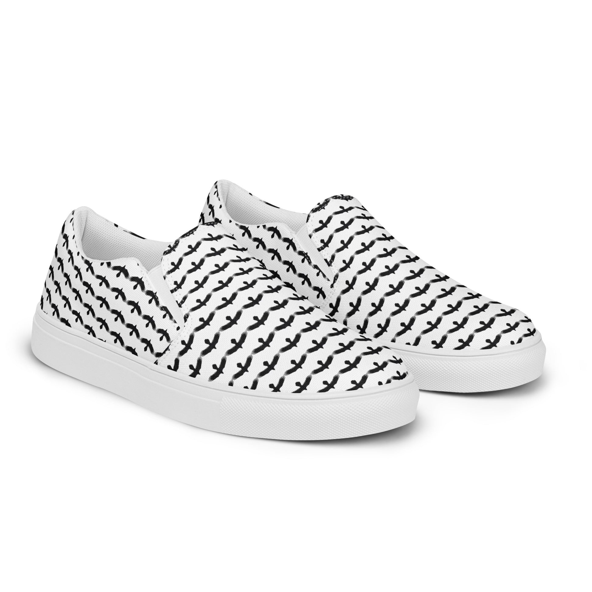 WildSage Market black raven pattern slip on shoes with white sole and black raven design